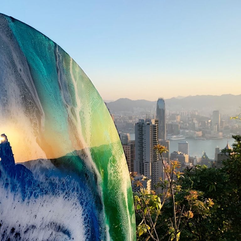 resin and mixed media artwork painting on round canvas close up and the Hong Kong view