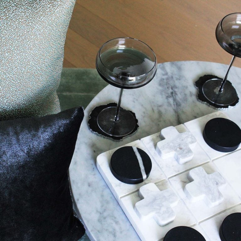 Sino Project resin black coasters on a table with the glass in the interior design show flat apartment