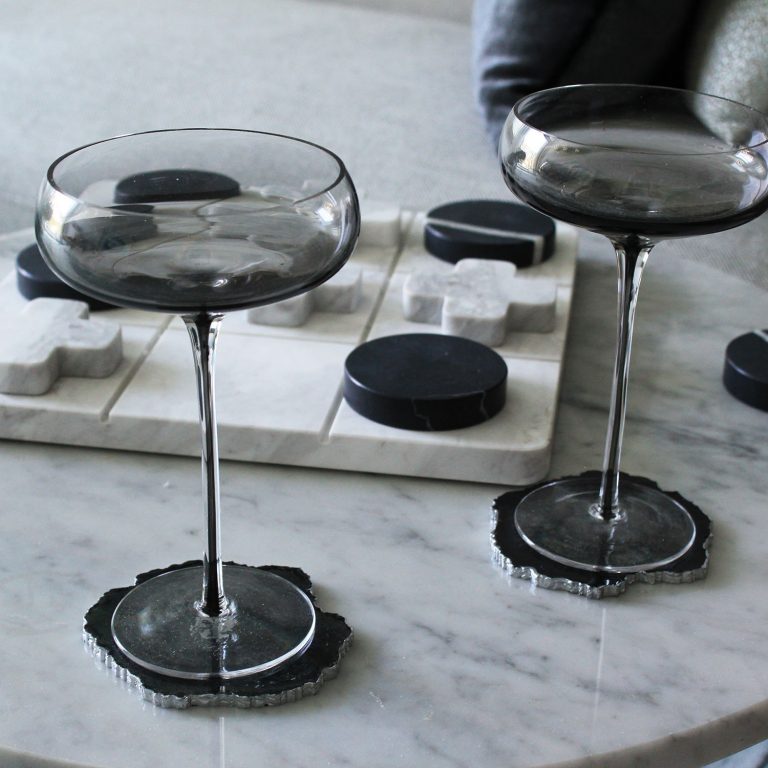 Sino Project resin black coasters on a table with the glass in the interior design show flat apartment